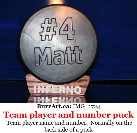 Player number 4 Matt engraved hockey puck